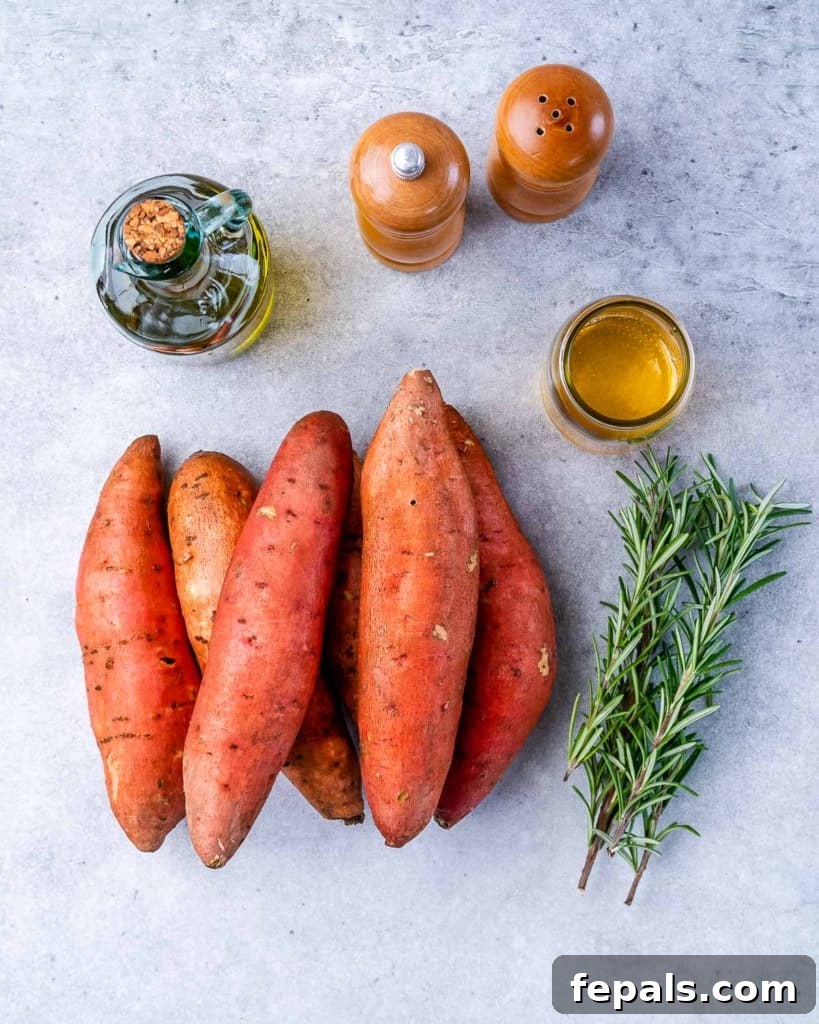 Caramelized Sweet Potatoes 4 Raw sweet potatoes arranged with sprigs of fresh rosemary, a bottle of honey, and a bottle of olive oil, ready for roasting.