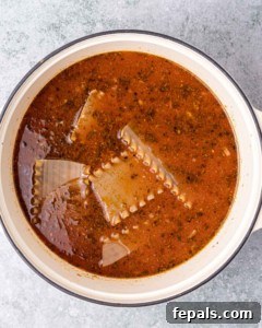 Hearty Lasagna Soup 15 Lasagna noodles simmering in soup.