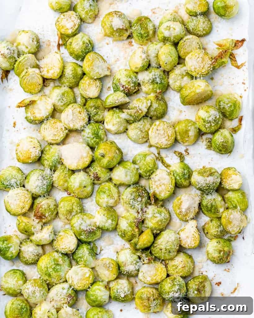 Roasted Brussels sprouts on a sheet pan.