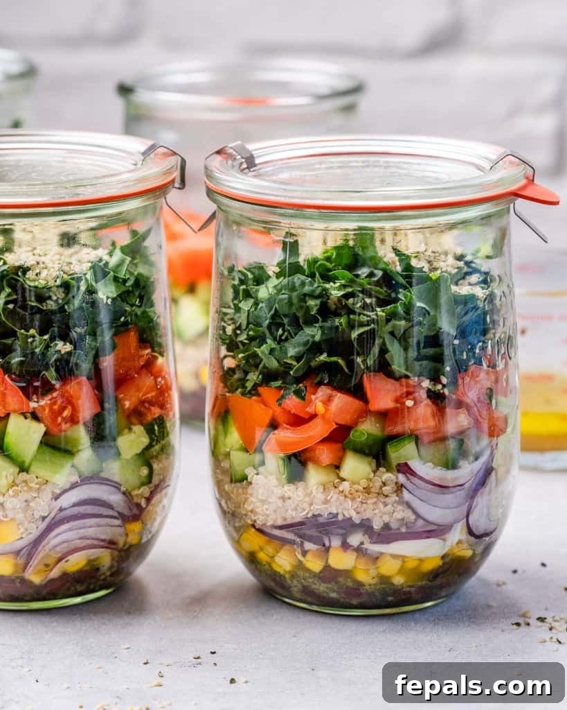 Tuscan Kale Power Jar 9 A beautifully layered Italian Kale Salad in a wide-mouth glass jar, ready for meal prep.