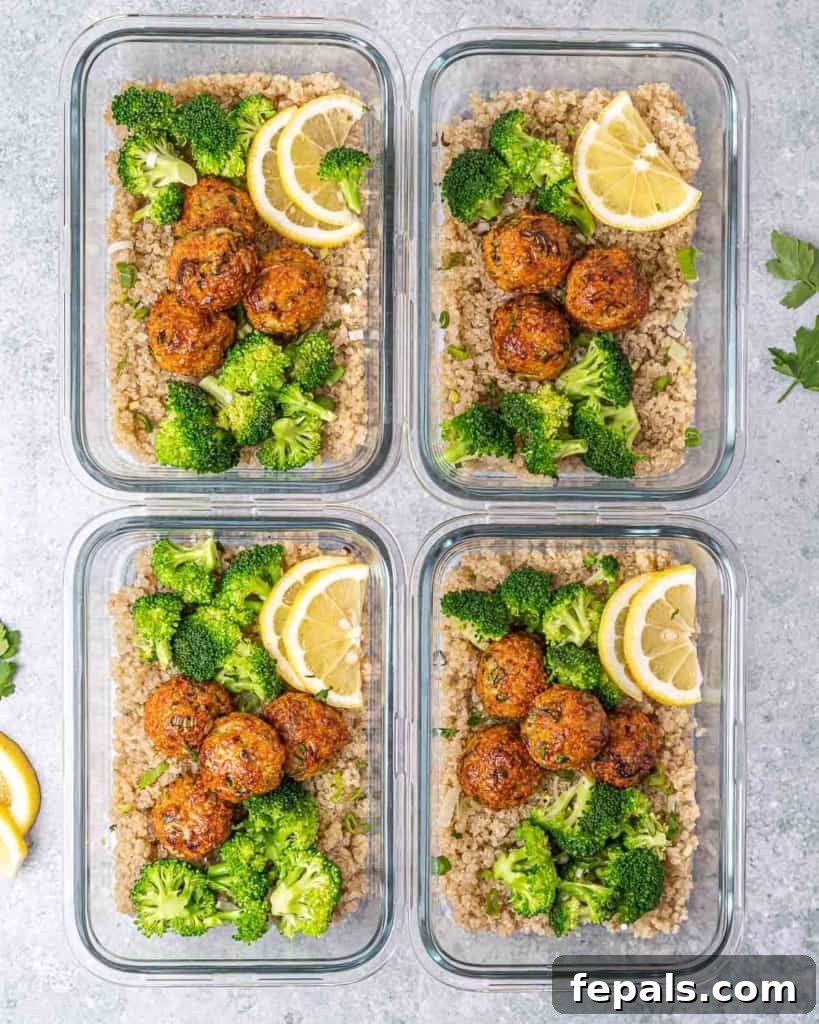Savory Garlic Chicken Meatball Bowl 2 top view of 4 meal prep glass bowls with chicken meat balls, quinoa and steamed broccoli