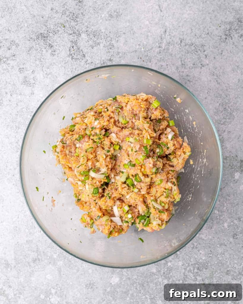 Savory Garlic Chicken Meatball Bowl 6 chicken meatball igredients mixed into the clear bowl