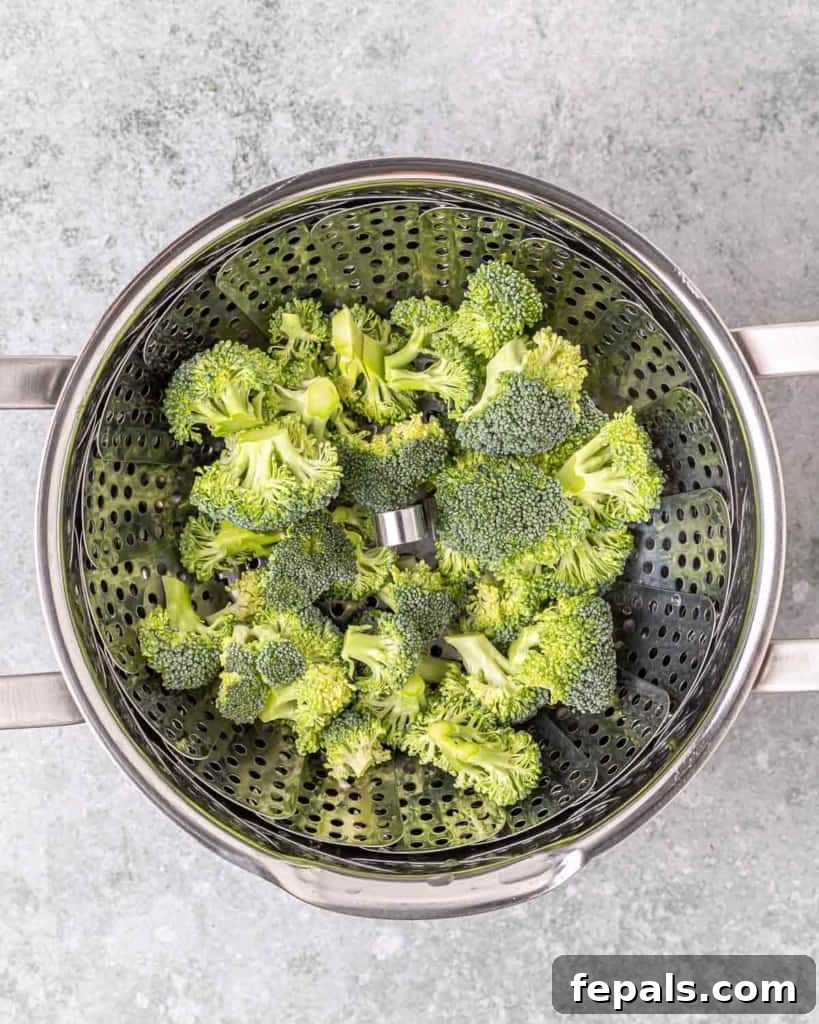 Savory Garlic Chicken Meatball Bowl 8 raw broccoli on colander before steaming