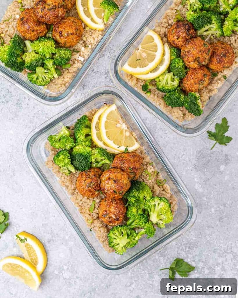 Savory Garlic Chicken Meatball Bowl 10 top view chicken meatballs in a bowl with quinoa and steamed broccoli