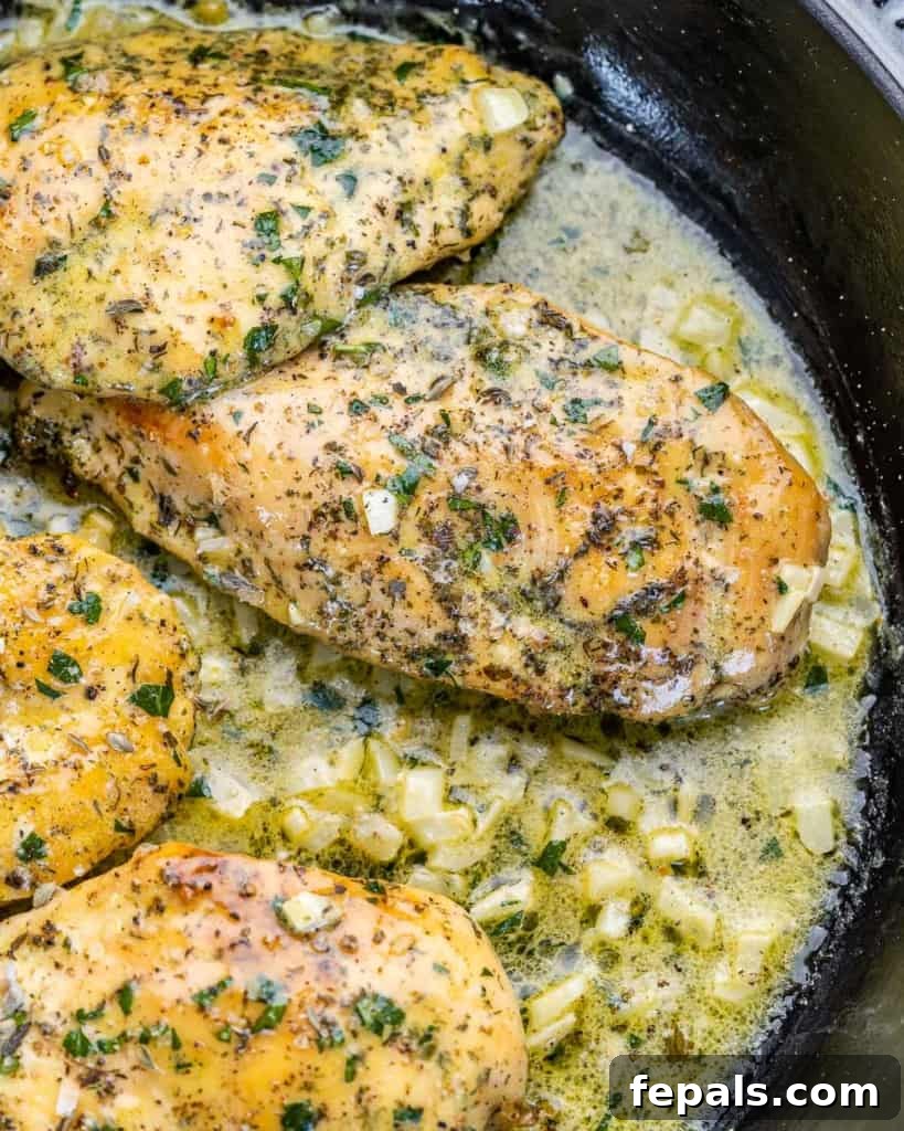 Garlic butter chicken in a large pan.