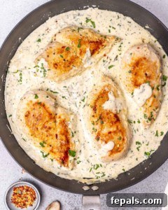 Velvety Ranch Chicken Delight 12 Cooking chicken breasts in a creamy white sauce.