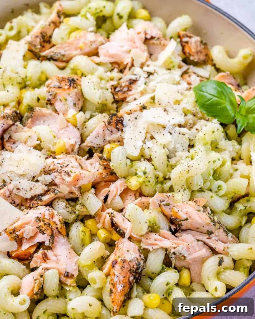 Savory Salmon Pesto Pasta 3 Flaked salmon combined with pesto pasta, shaved Parmesan and corn.