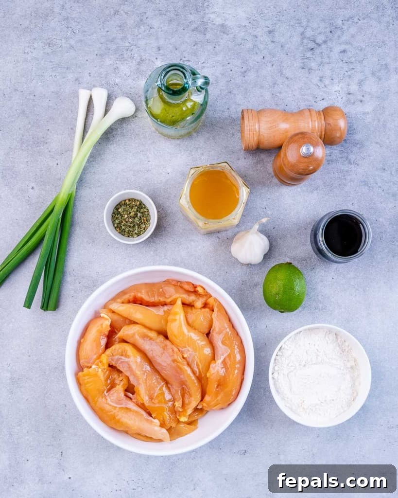 Raw chicken tenderloins, honey, flour and seasonings divided into small portions.