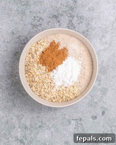 Combining dry ingredients in a large bowl.