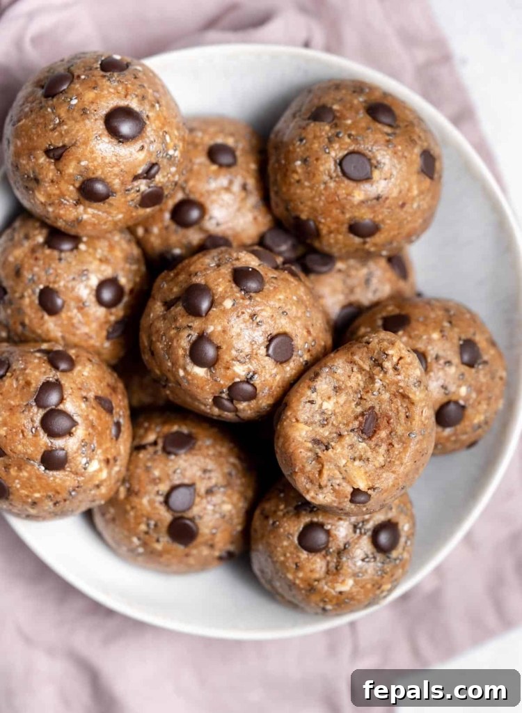 stacks of energy balls on a round white plate