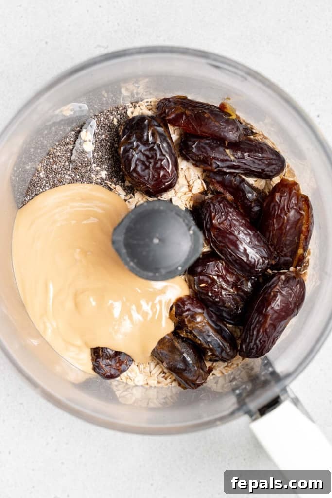 cashew butter added with oats, dates and chia seeds in a food processor