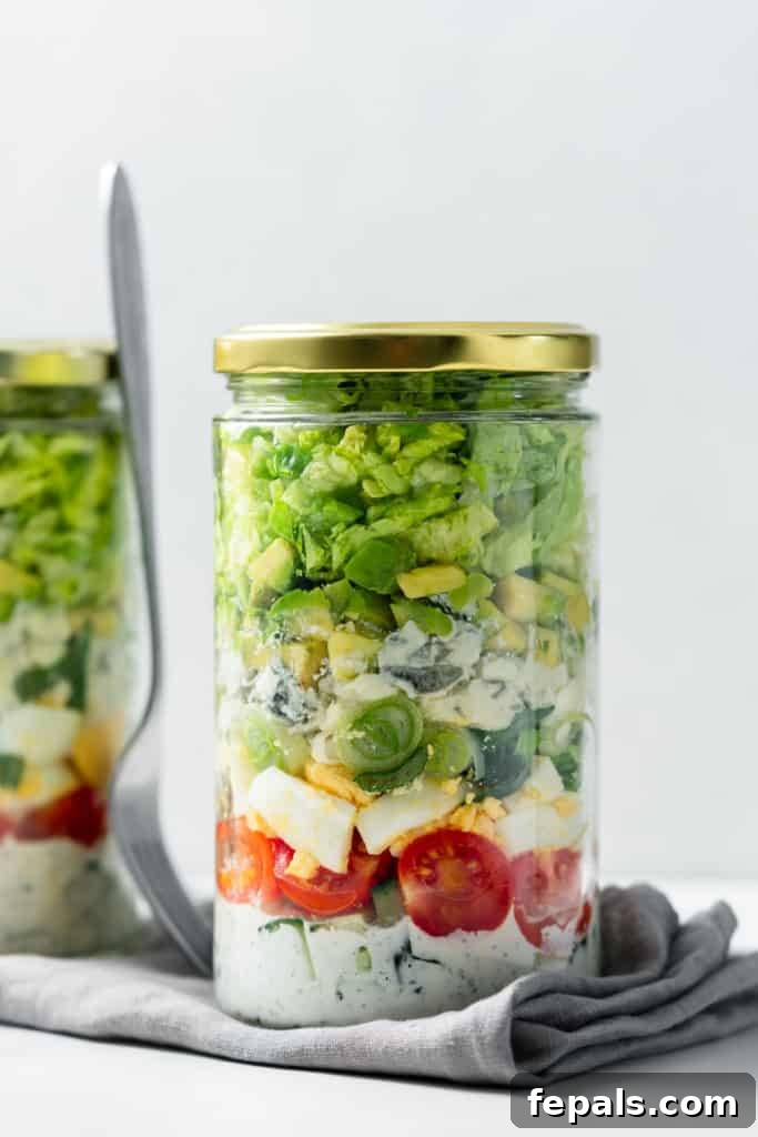Plant-Powered Cobb Salad 2 Cobb salad layered in a jar.