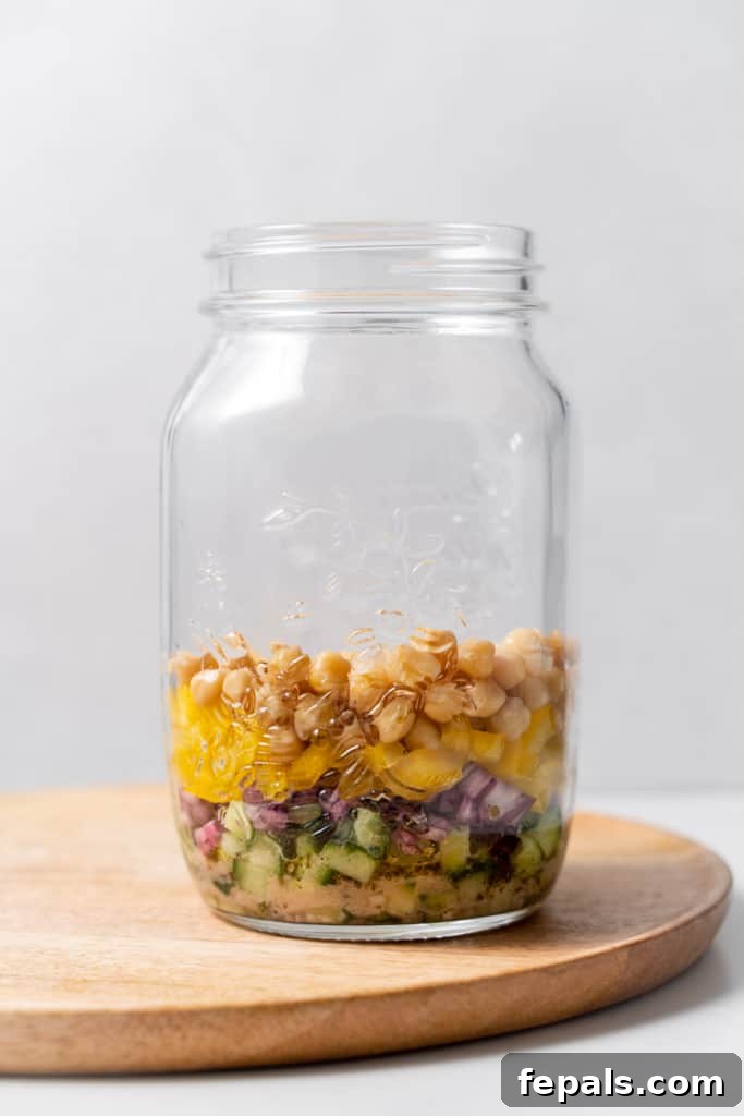 Layered Jar Salads 9 Chopped peppers and chickpeas added to the jar