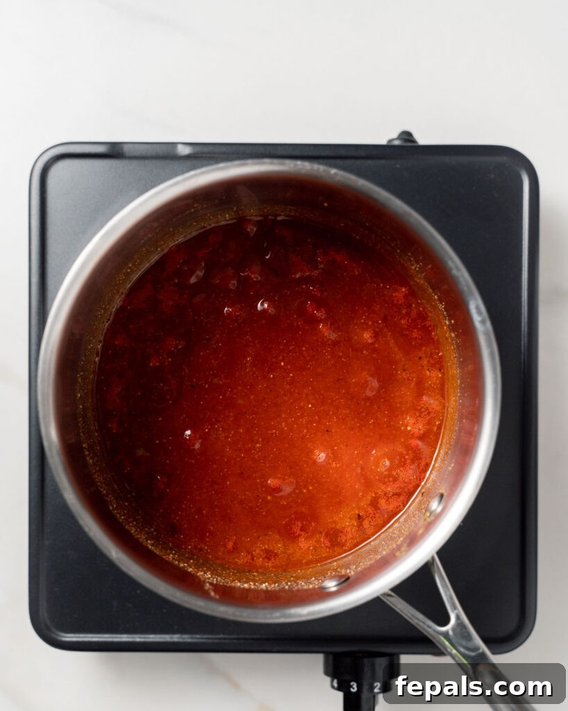 bbq sauce simmering in a pot