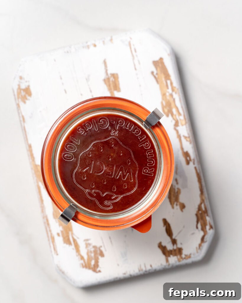 bbq sauce in a sealed jar to be stored 