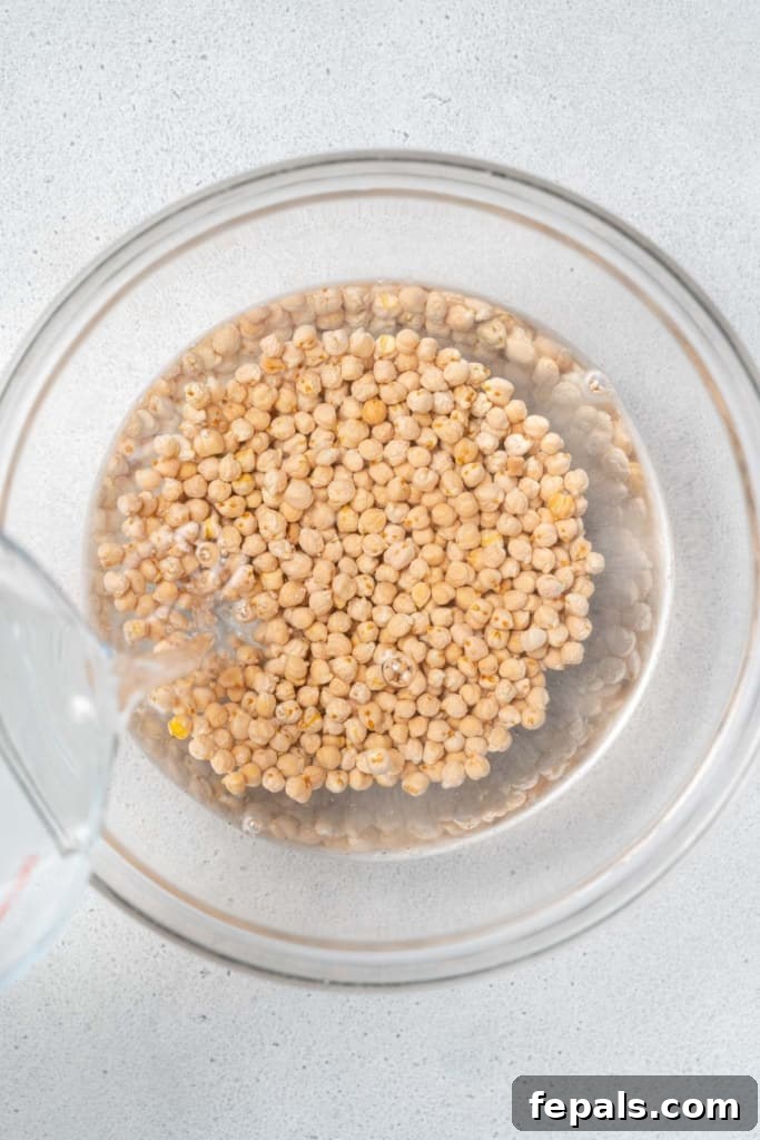 Your Guide to Perfectly Cooked Chickpeas 6 Covering chickpeas with water.