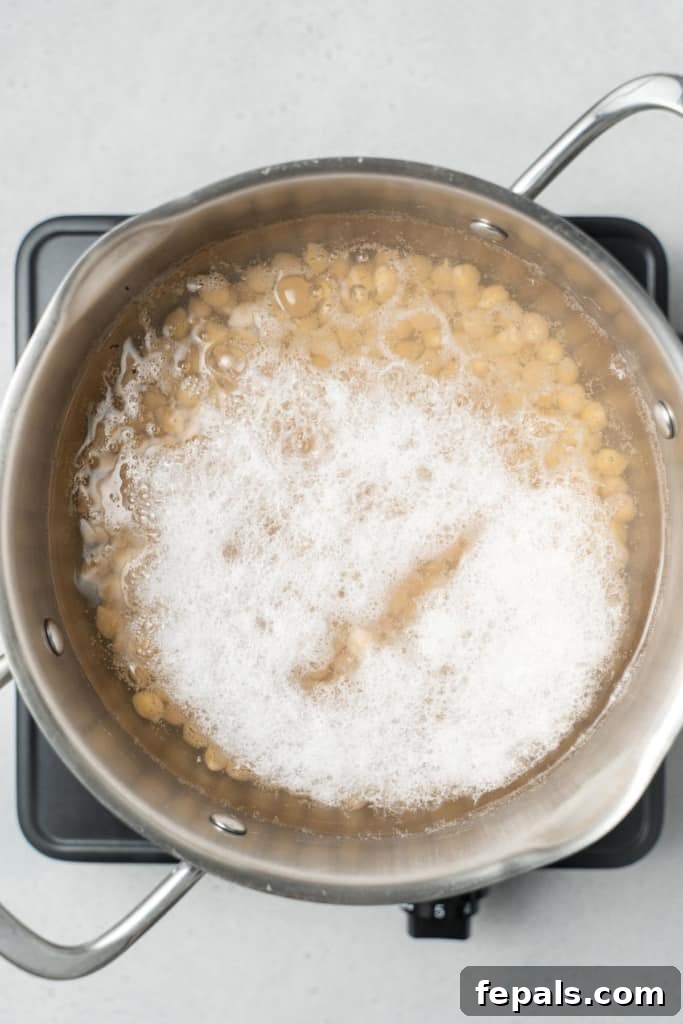 Your Guide to Perfectly Cooked Chickpeas 8 Bringing a pot of chickpeas to a boil.