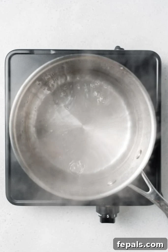 Perfect Stovetop Broccoli 5 Water boiling in a pot.
