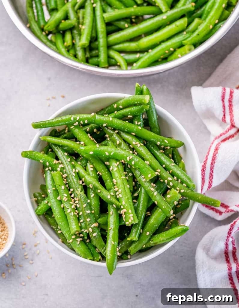 Garlic Sautéed Green Beans 2 Sautéed green beans tossed with toasted sesame seeds.