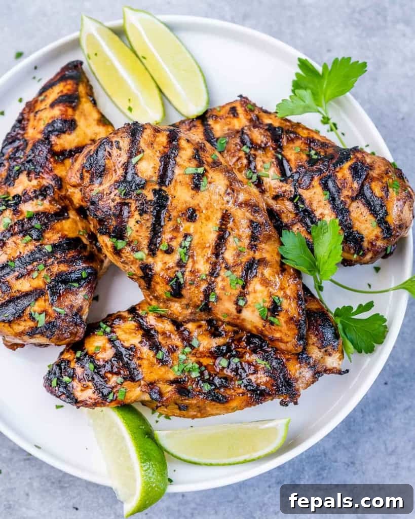 Crispy Honey Chipotle Chicken 10 top view grilled chicken breast on a round white plate