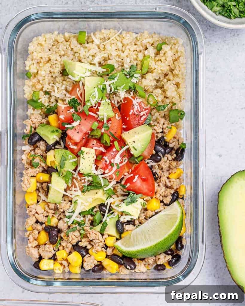 Ready-to-Eat Chicken Taco Bowls 2 top view chicken meal prep bowl with quinoa and beans