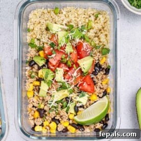 top view glass bowl of meal pre ground chicken taco with quinoa and beans