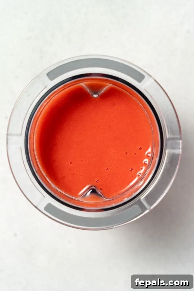 Strawberry puree in a blender.
