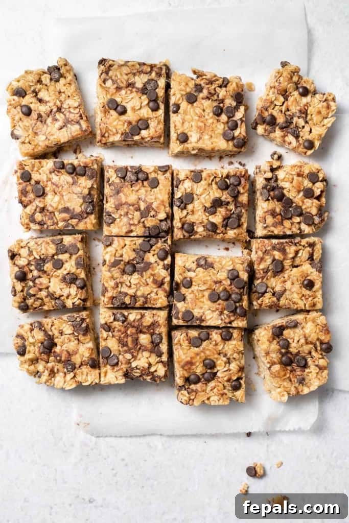 Top view of peanut butter oatmeal bars cut into squares, showcasing a perfect snack or dessert.