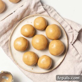 top view of peanut butter balls on a round white plate