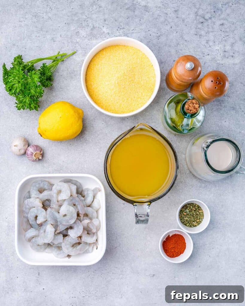 Golden Grits and Gulf Delights 4 ingredients for shrimp and grits laid out on a flat surface
