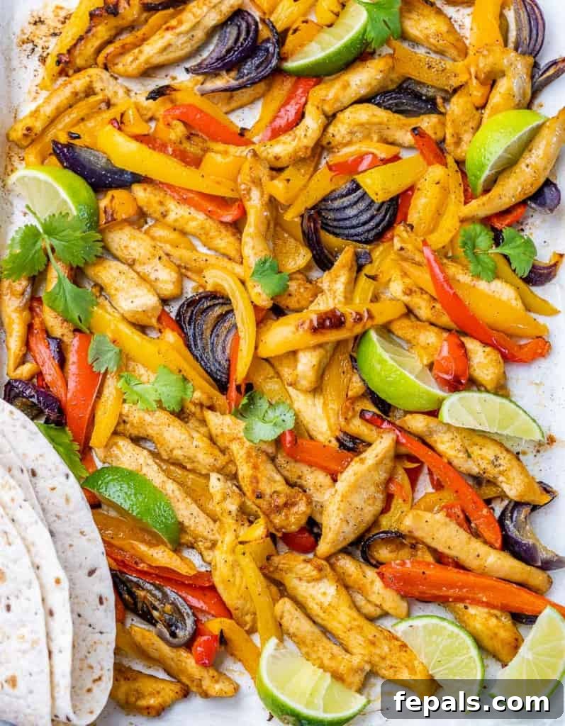 top view chicken fajita on a pan with side of tortilla 