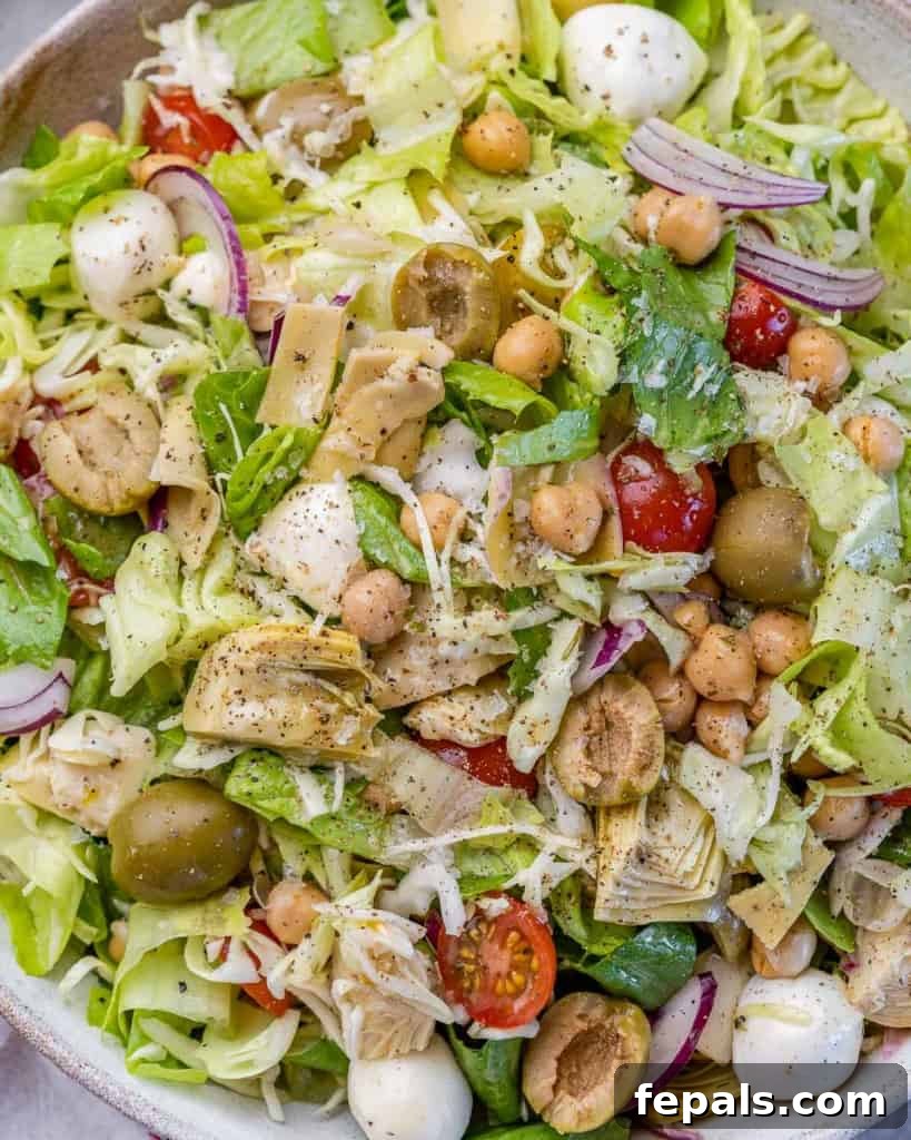 Zesty Italian Chop 10 top view close up image of chopped salad, inviting you to take a bite