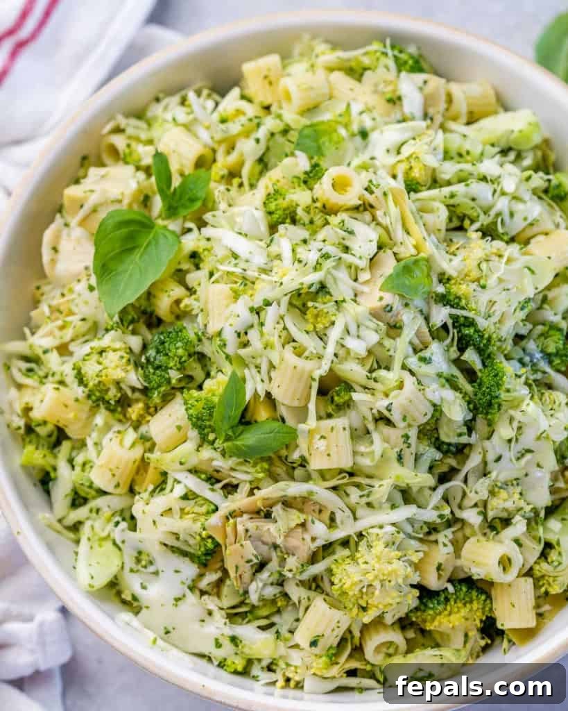 Zesty Green Goddess Pasta Salad 10 Top view of pasta salad in a round white bowl, beautifully presented.