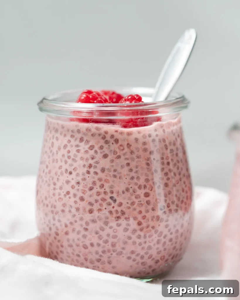side shot of chia pudding in a jar with a rustic background
