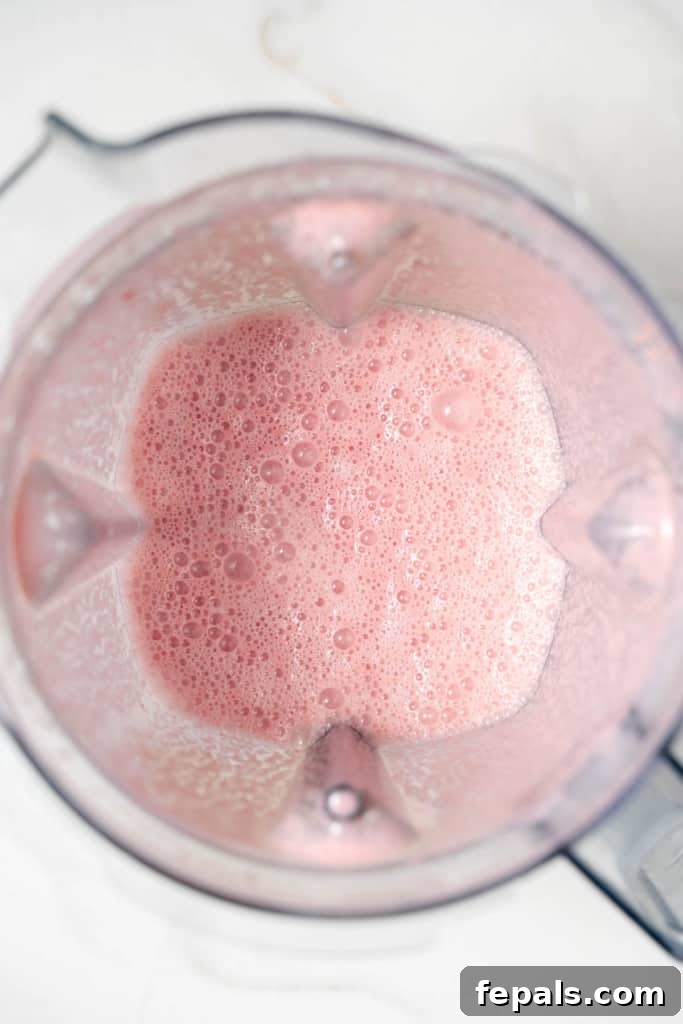 ingredients added in blender, blended to a smooth pink mixture