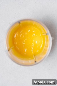 Tropical Mango Chia Bliss 19 pureed mango in blender