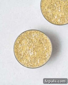 Tropical Mango Chia Bliss 23 mango chia pudding in a glass jar with no topping yet.