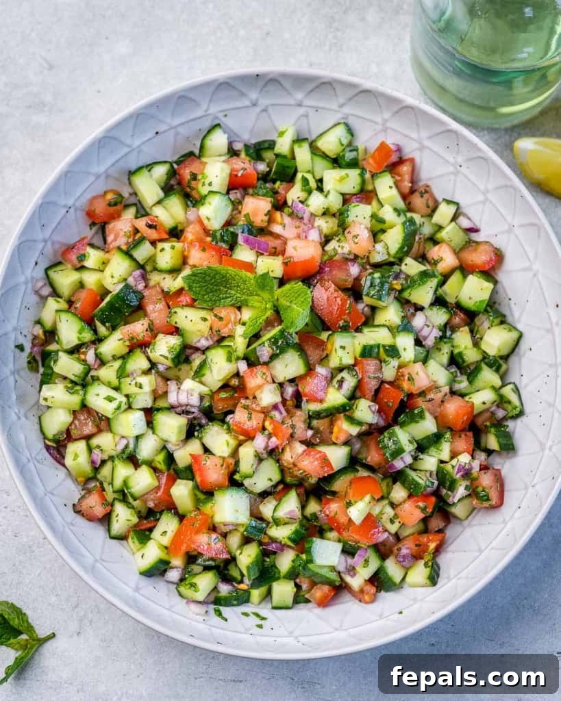 Refreshing Persian Shirazi Salad 8 Top view of a generously sized bowl filled with freshly made Shirazi Salad, highlighting the vibrant colors and finely diced ingredients.