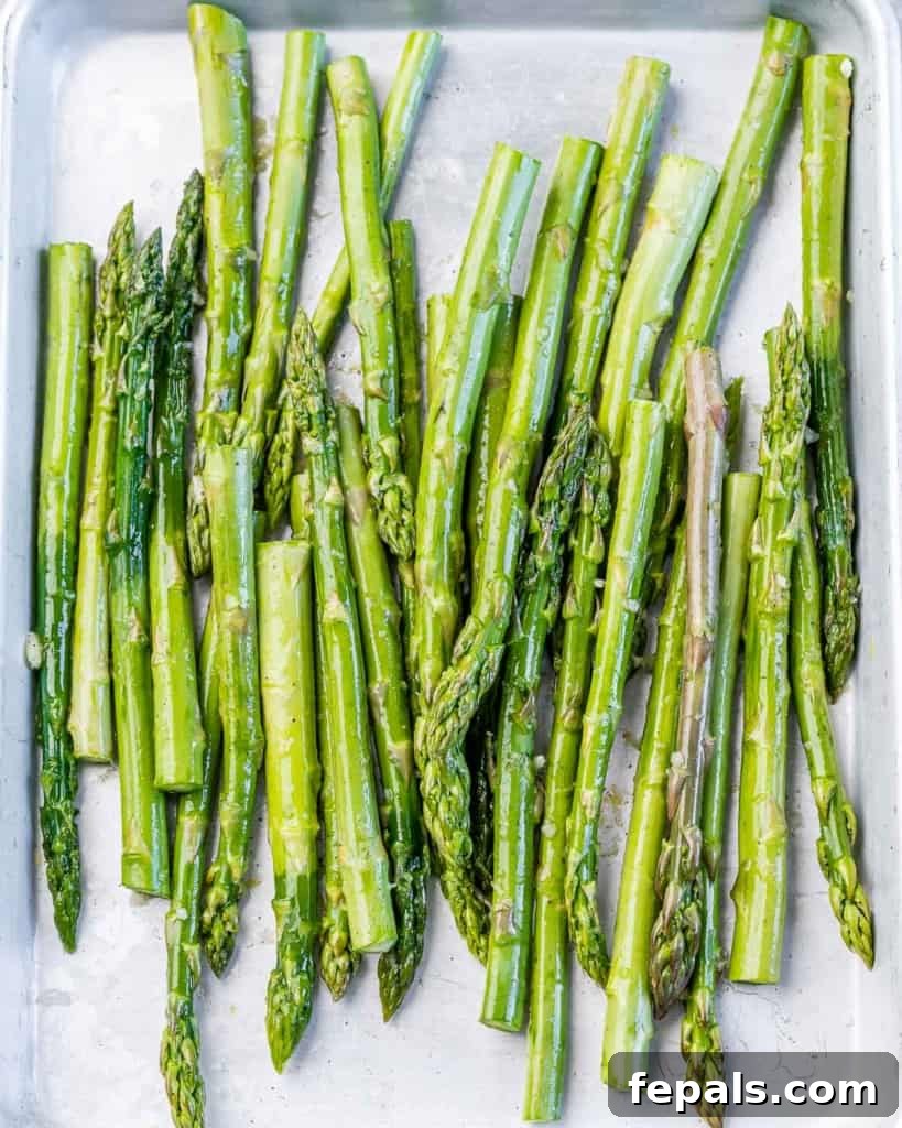 Charred Asparagus with Zesty Lemon-Garlic 5 Tossing asparagus in olive oil and lemon juice.