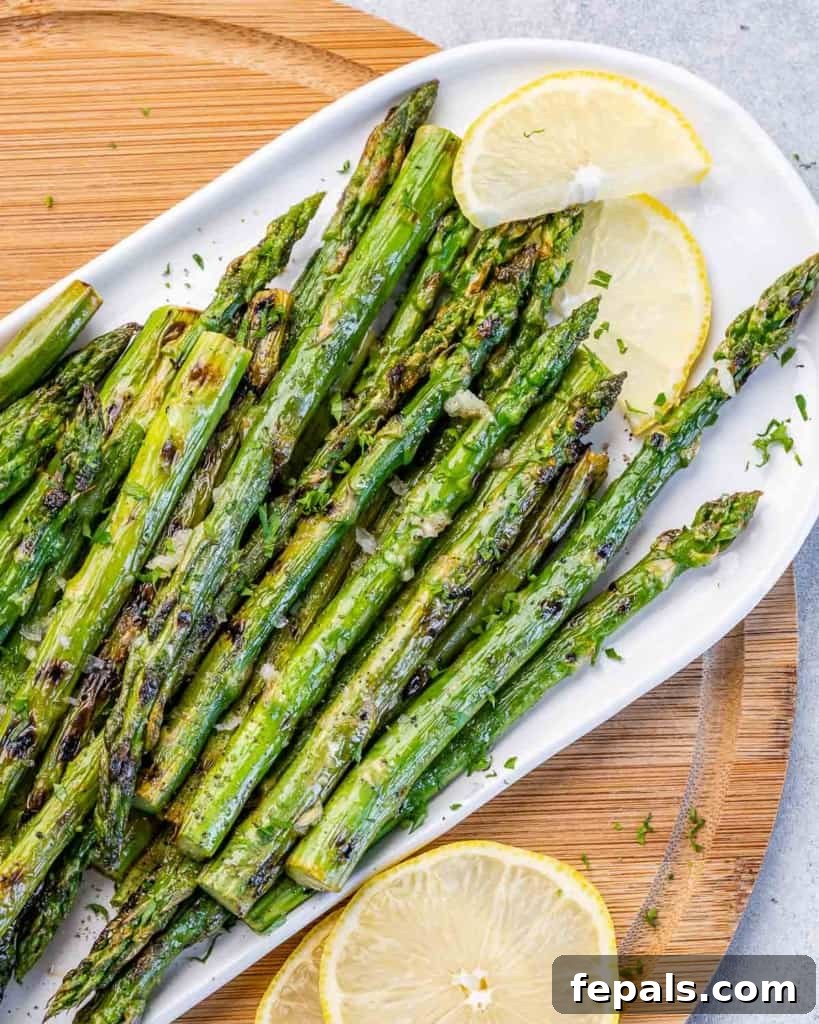 Charred Asparagus with Zesty Lemon-Garlic 10 Spears of asparagus seasoned with lemon and garlic and grilled.