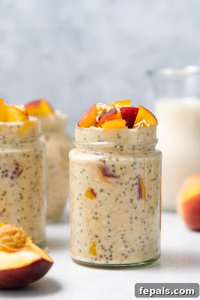 Velvet Peach Dream Oats 13 Peach overnight oats topped with chopped peaches.