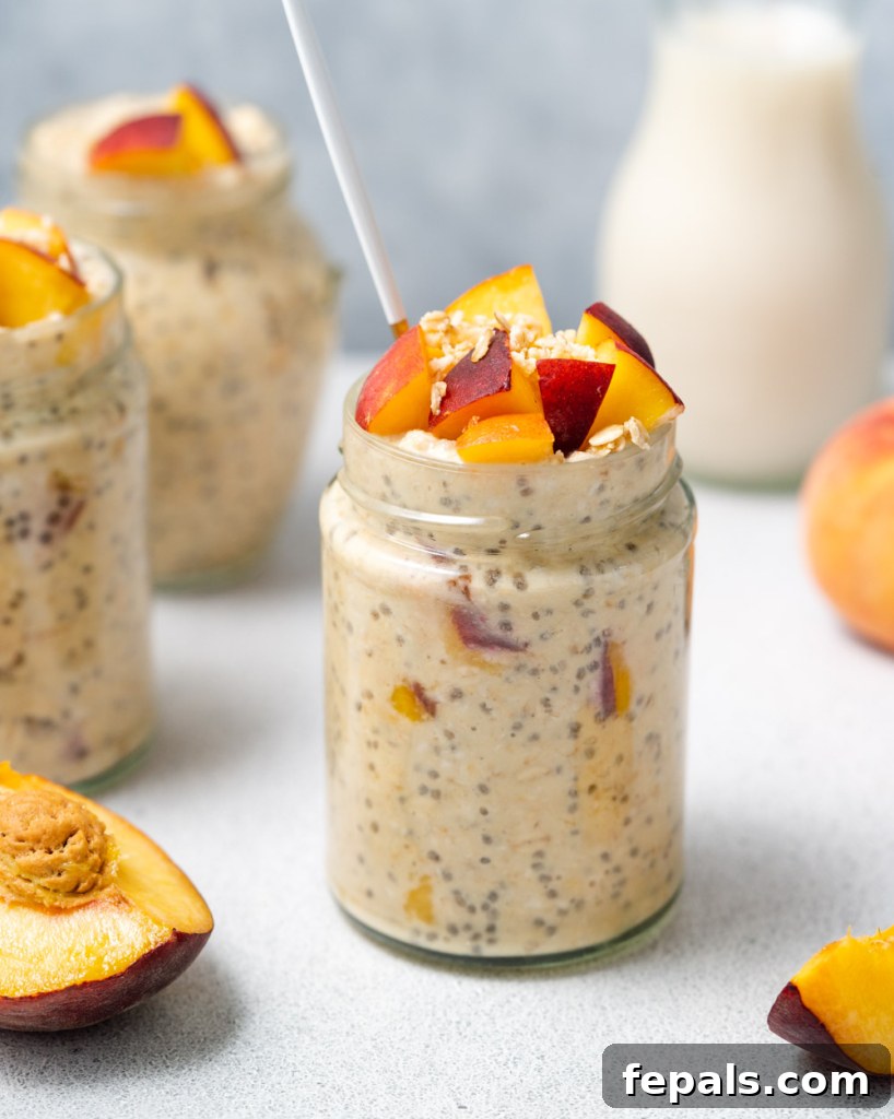 Velvet Peach Dream Oats 3 Overnight oats in a jar, topped with chopped peaches.