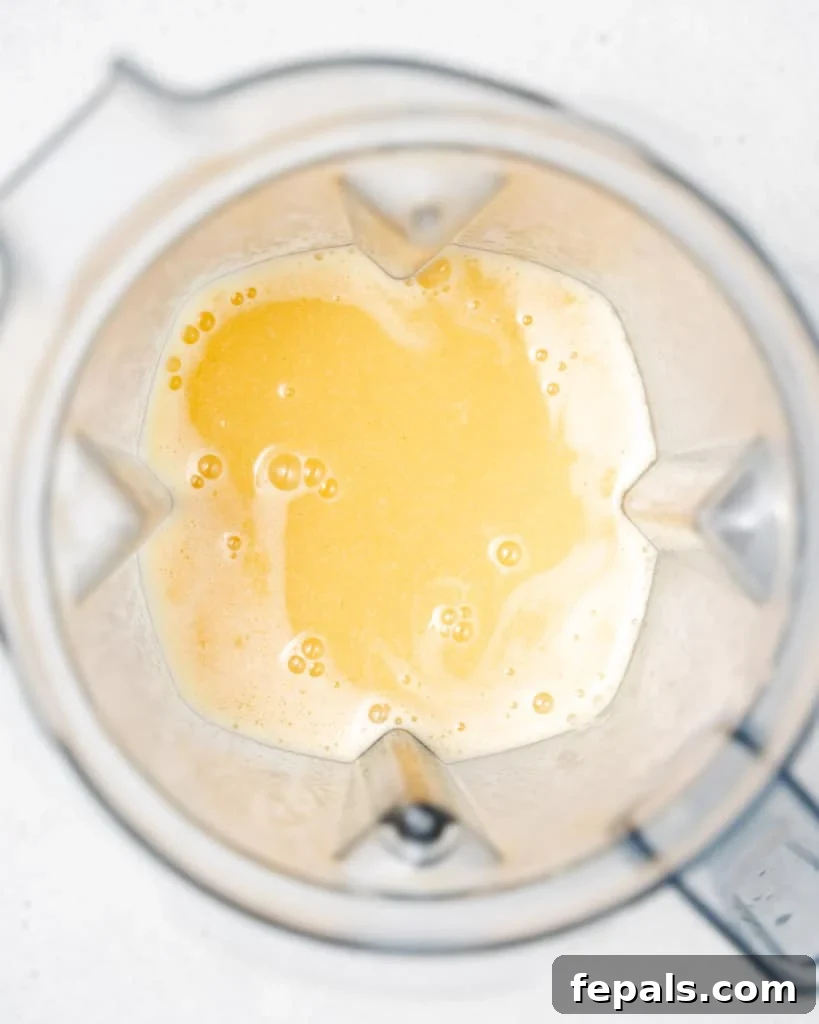 Velvet Peach Dream Oats 6 Blending peaches milk and honey.