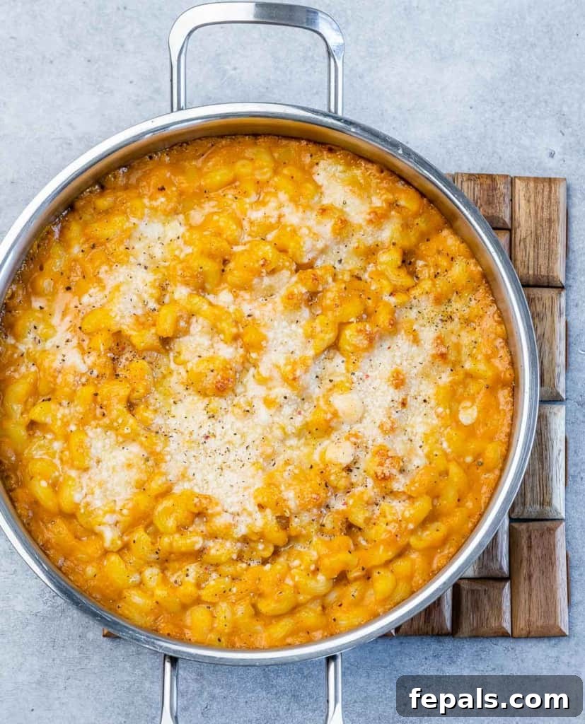Roasted Pumpkin Mac and Cheese 9 Baked pumpkin Mac and cheese in a pot.