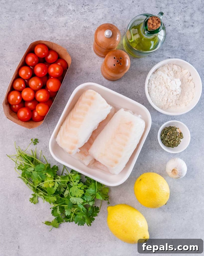 Bright Lemon Garlic Cod Bake 4 ingredients to make lemon garlic baked cod with tomatoes