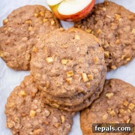 Top view apple oatmeal cookies on a flat surface.