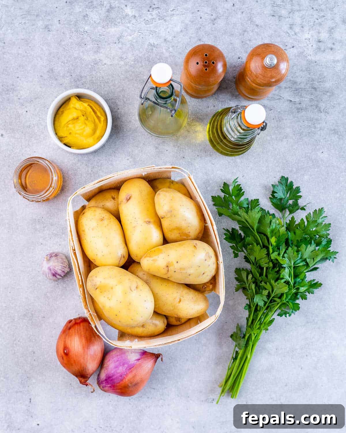 Hearty Warm German Potato Salad 4 Uncooked potatoes, shallots, honey, mustard, oil, vinegar and parsley.