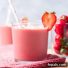strawberry banana smoothie in a cup