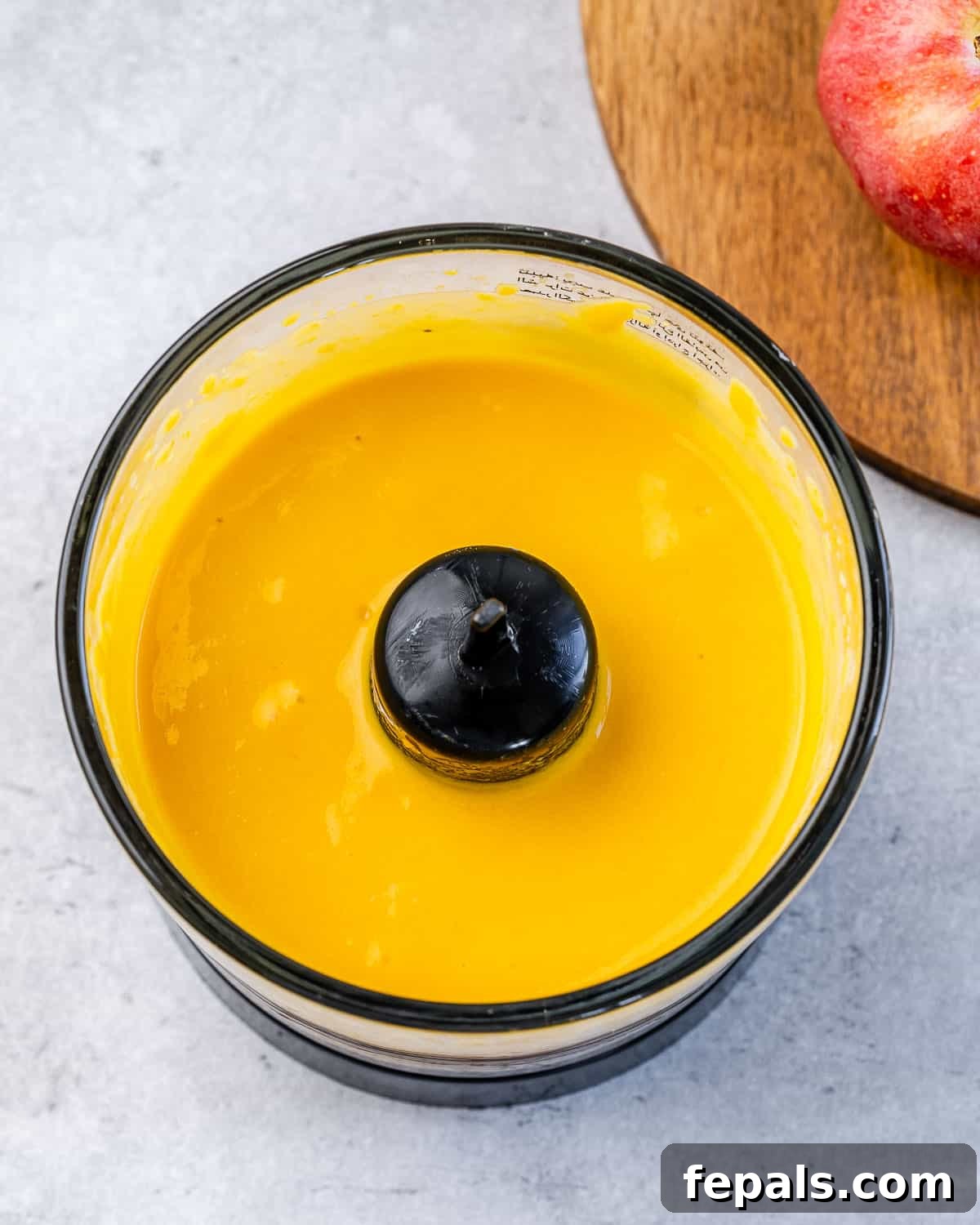 Pumpkin dip blended in a food processor.