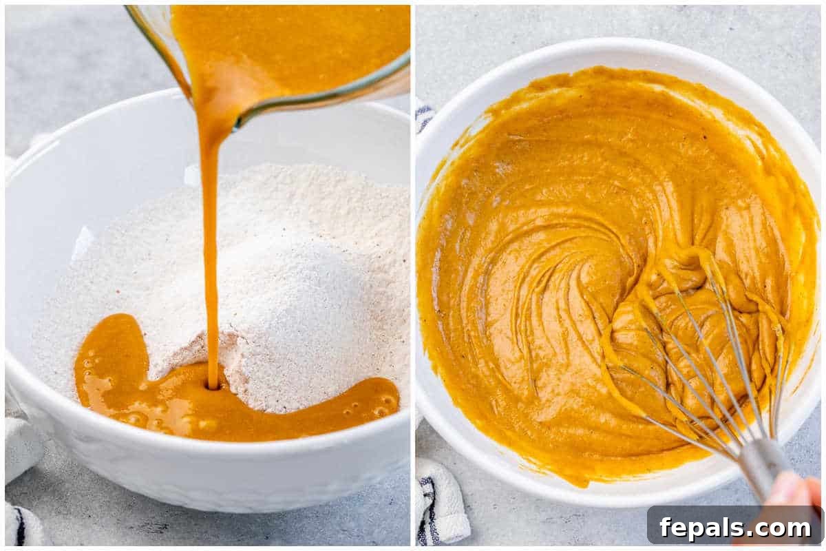 Process shot showing the wet pumpkin mixture being poured into the dry flour mixture to make the bread batter.